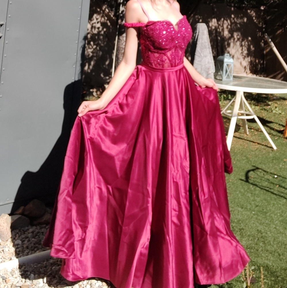 Maroon Prom dress with corset style top and a silk bottom